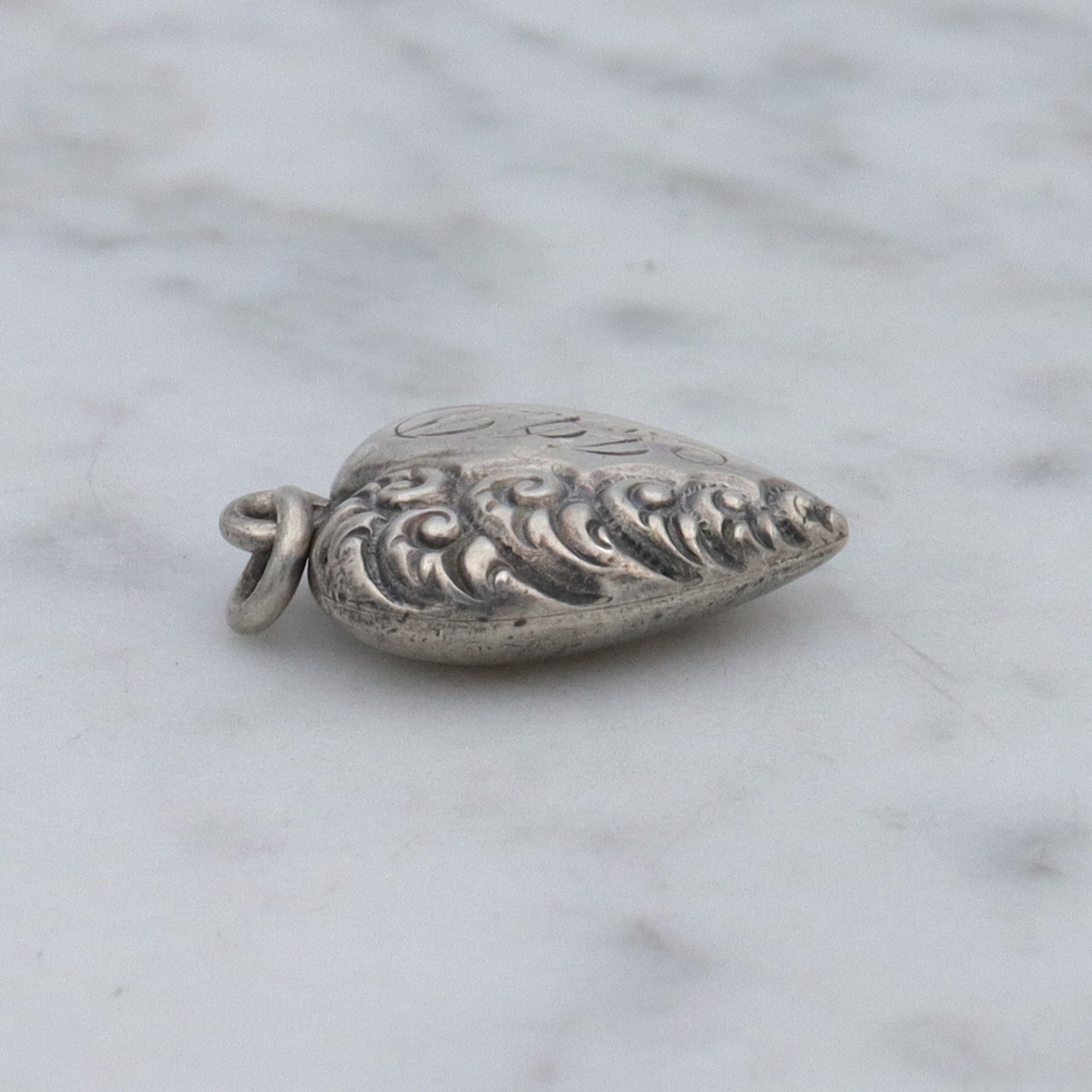 Antique Victorian repousse puffy heart charm pendant with monogram “J.A.D”